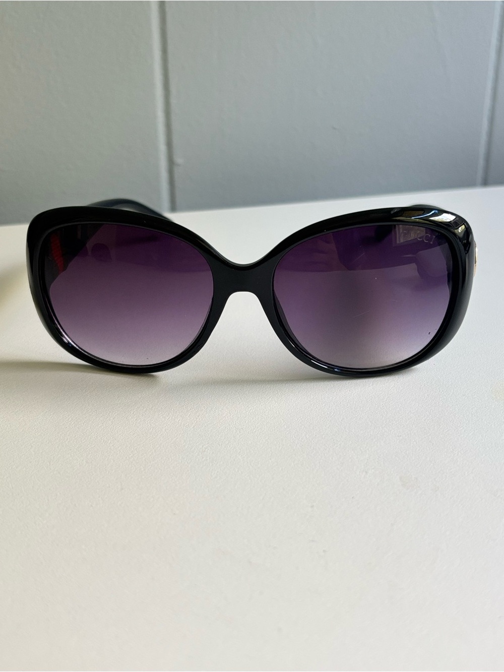 Gucci Black Frame Sunglasses with Purple Gradient Lenses